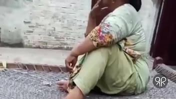 Desi Pakistani Aunty Puffing Smoke With Sultry Lips