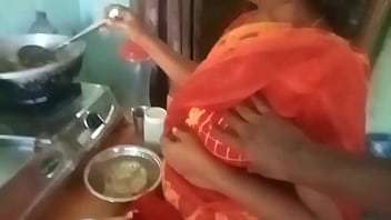 Aunty’s Steamy Kitchen Seduction: Her Skilled Hands Work Magic On A Young Stud’s Throbbing Cock