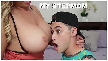 Stepson’s Forbidden Desire Ignites As His Busty Milf Stepmom Seduces Him Into A Wild, Raw Encounter.