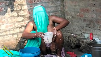 Desi Radhika’s Sensual Village Bathing Scene In Hindi