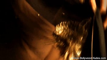Sultry Curves In Motion: A Mature Belly Dancer’s Seductive Art