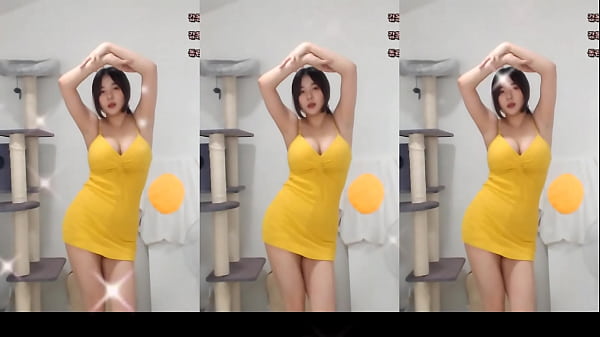 Voluptuous Korean Beauty Sways Seductively In A Sun-kissed Yellow Dress
