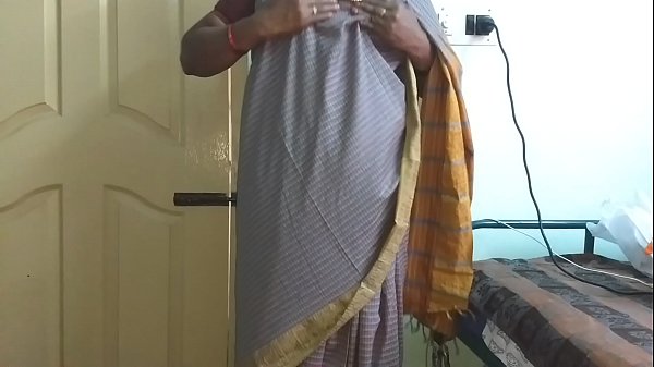 Sensuous Vanitha In A Slate Grey Saree: Revealing Her Curves And Tenderly Touching Herself