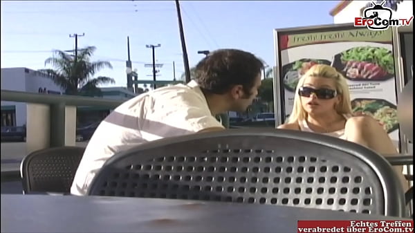 Street-side Seduction: A Busty Blonde’s Bold Invitation