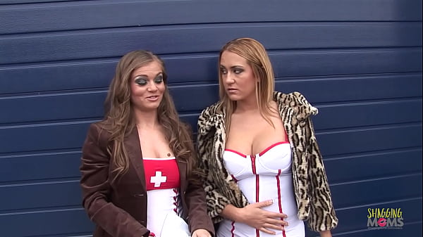 Two Nurses Can’t Afford Their Bills, So They Take Turns On Their Knees, Swallowing Cocks To Fund Their Sexy Lingerie Stash.