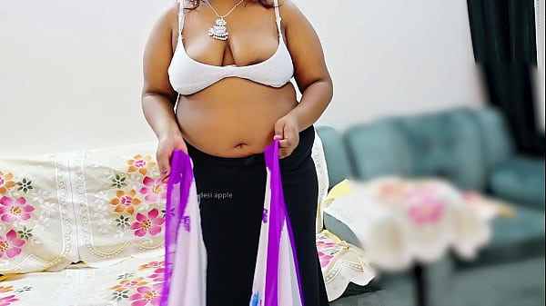 Indian Bhabhi In A Saree, Her Curves Teasing Through The Fabric, Ready To Be Unwrapped