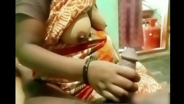 Indian Aunty’s Slippery Hand Wraps Around Boy’s Stiff, Throbbing Cock